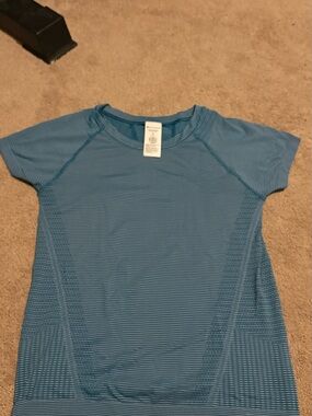 Athleta XS Striped Women’s momentum shirt